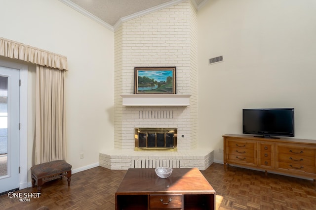 living room featuring ornamental molding, vaulted ceiling, dark parquet floors, and a fireplace