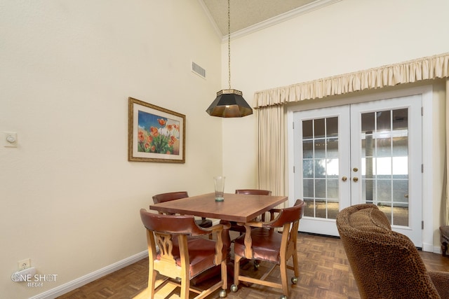 dining area featuring french doors, ornamental molding, high vaulted ceiling, and dark parquet flooring