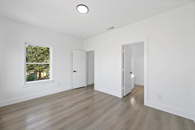 unfurnished bedroom featuring light hardwood / wood-style flooring