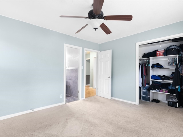 bedroom featuring a closet, ceiling fan, and carpet