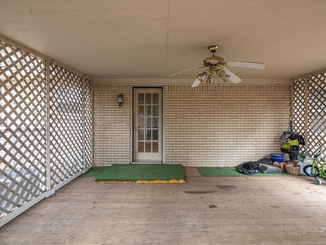 exterior space featuring ceiling fan