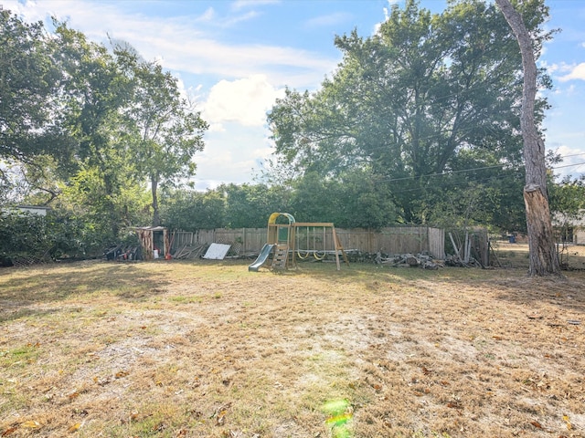 view of yard featuring a playground