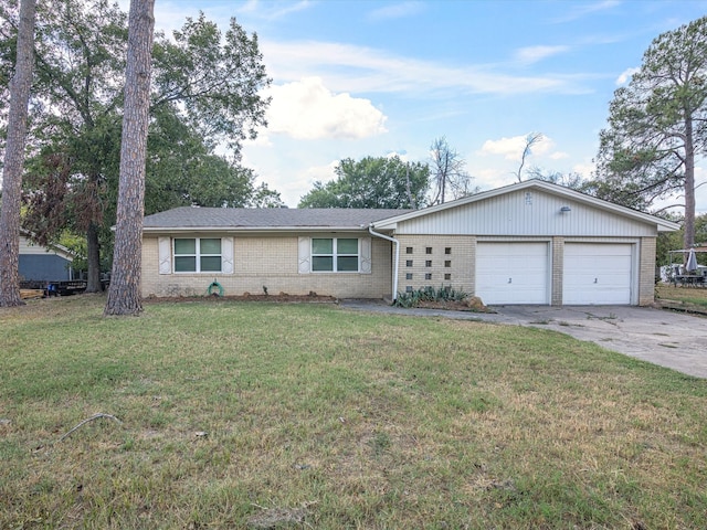 ranch-style house featuring a garage and a front lawn