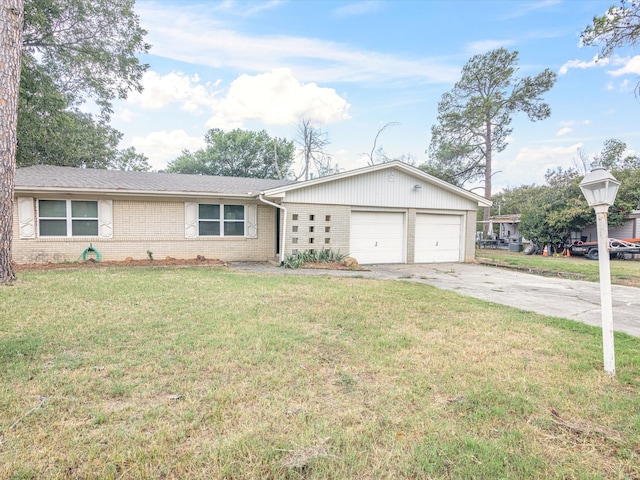 ranch-style house with a garage and a front lawn