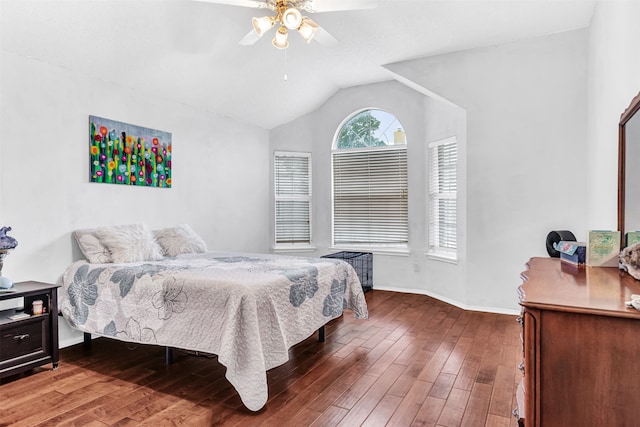 bedroom featuring lofted ceiling, hardwood / wood-style floors, and ceiling fan