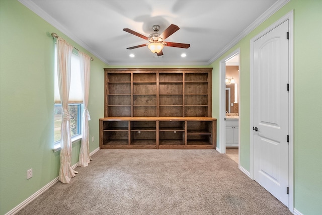 interior space featuring crown molding, plenty of natural light, and ceiling fan