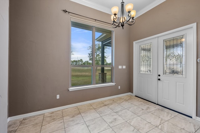 foyer featuring an inviting chandelier and ornamental molding