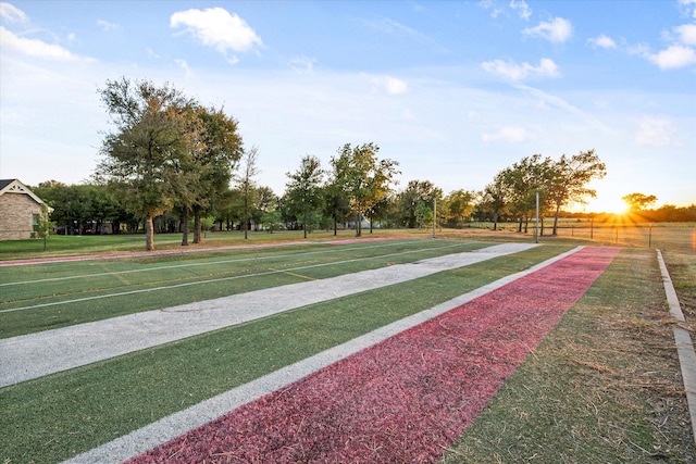 view of home's community with a lawn