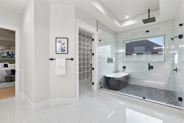 389 Arbor Mill Ct, Sunnyvale, TX 75182 - full bath featuring a shower stall, a soaking tub, a spacious closet, baseboards, and a raised ceiling