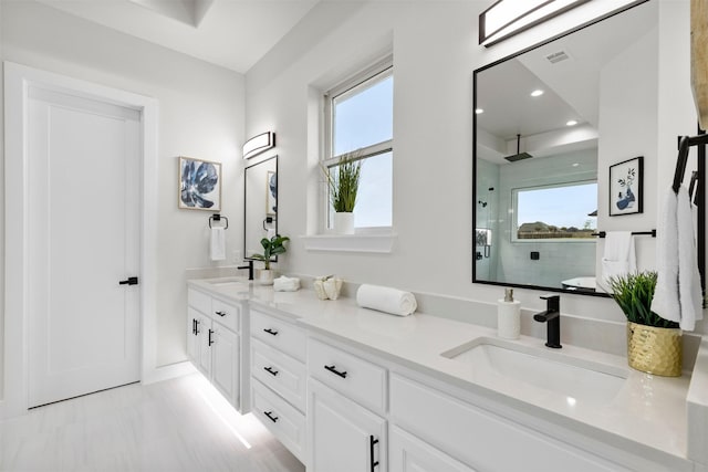 389 Arbor Mill Ct, Sunnyvale, TX 75182 - full bathroom featuring plenty of natural light, double vanity, tiled shower, and recessed lighting