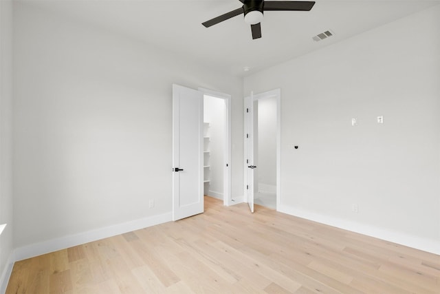389 Arbor Mill Ct, Sunnyvale, TX 75182 - unfurnished room with light wood finished floors, ceiling fan, and baseboards