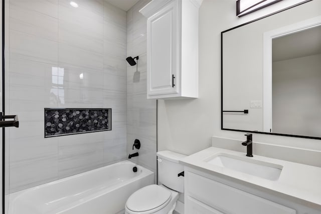 full bathroom featuring shower / bathtub combination, vanity, and toilet