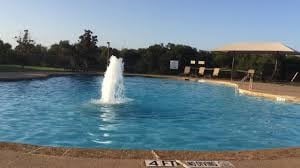 view of pool with a water view