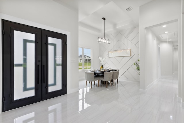 389 Arbor Mill Ct, Sunnyvale, TX 75182 - foyer with french doors, a raised ceiling, baseboards, and an accent wall