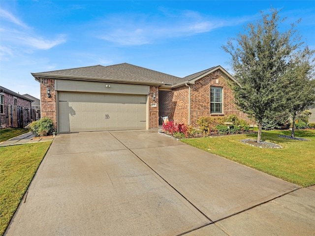 single story home featuring a front yard and a garage