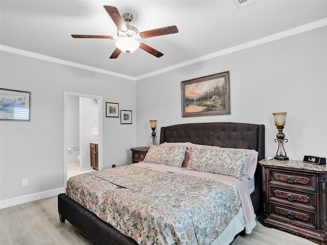 bedroom featuring light hardwood / wood-style floors, ornamental molding, ensuite bath, and ceiling fan