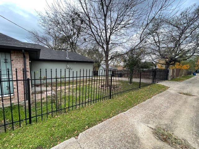 view of property exterior with a yard