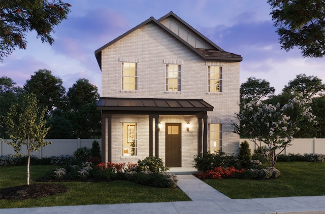 view of front of house featuring a yard