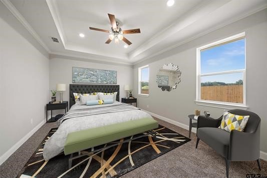 carpeted bedroom featuring ceiling fan, a raised ceiling, multiple windows, and crown molding