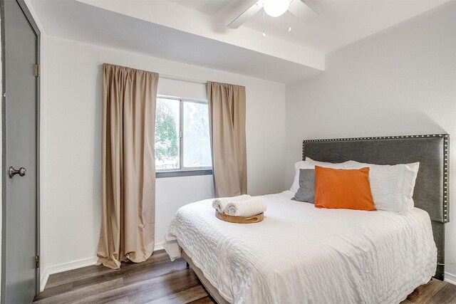 bedroom with hardwood / wood-style floors and ceiling fan