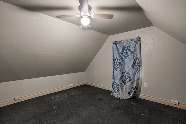 bonus room featuring ceiling fan, carpet flooring, and vaulted ceiling