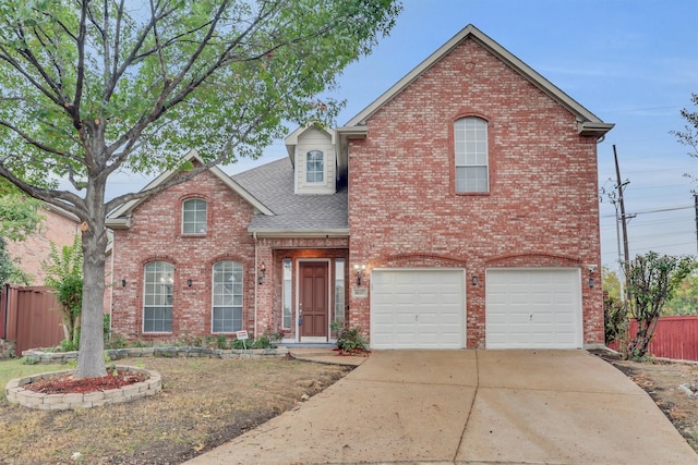 front of property with a garage