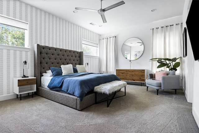 carpeted bedroom with ceiling fan