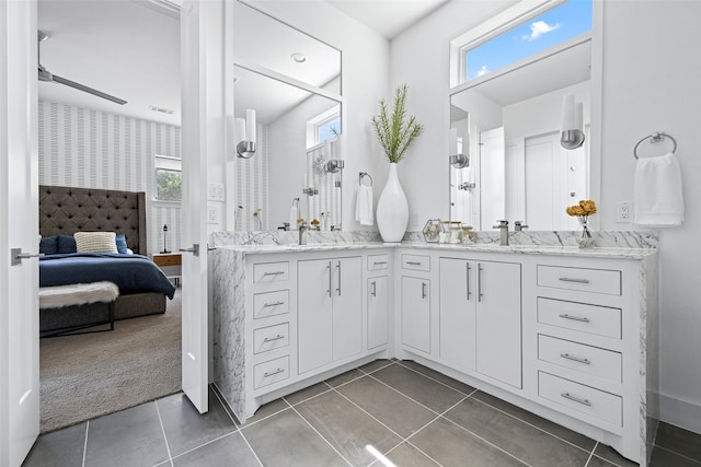 bathroom with vanity, tile patterned floors, and plenty of natural light