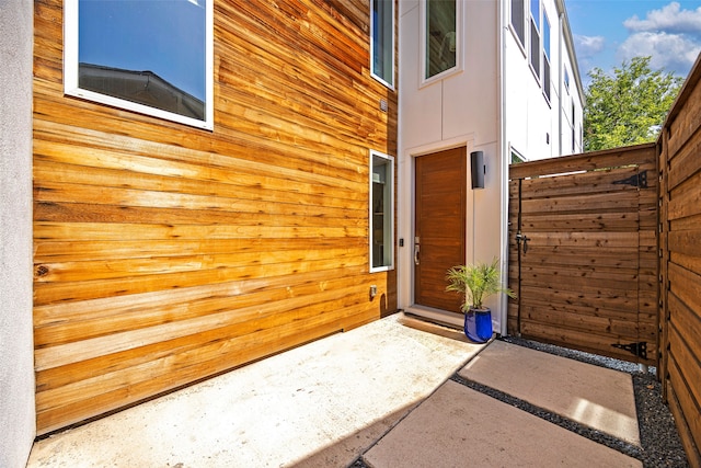 doorway to property featuring a patio