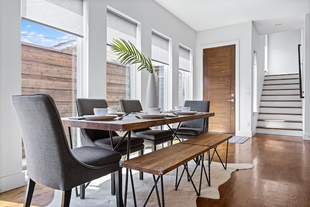 dining space featuring hardwood / wood-style flooring