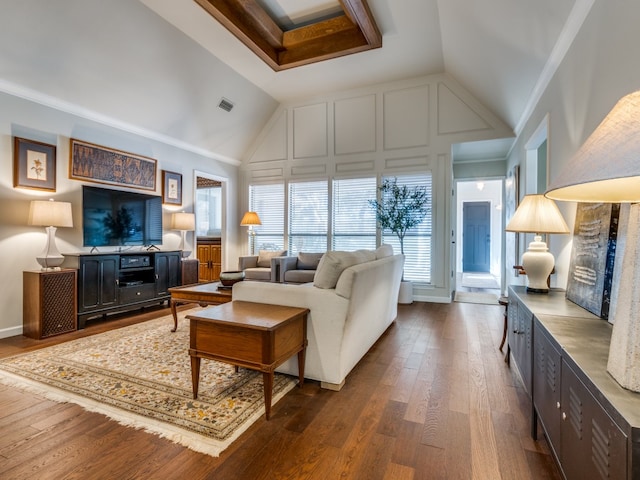 living room featuring dark wood-type flooring, crown molding, and plenty of natural light