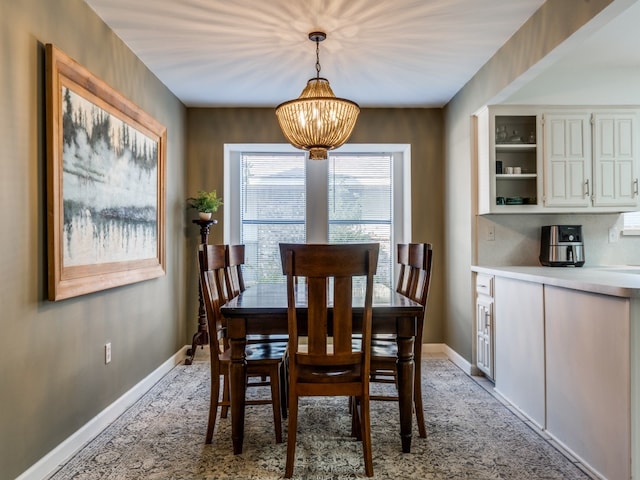 dining area with a chandelier