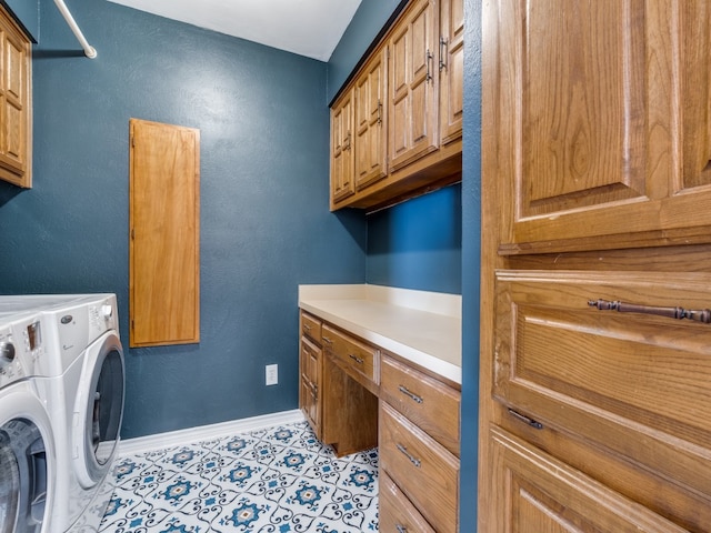 clothes washing area with independent washer and dryer, cabinets, and light tile patterned floors