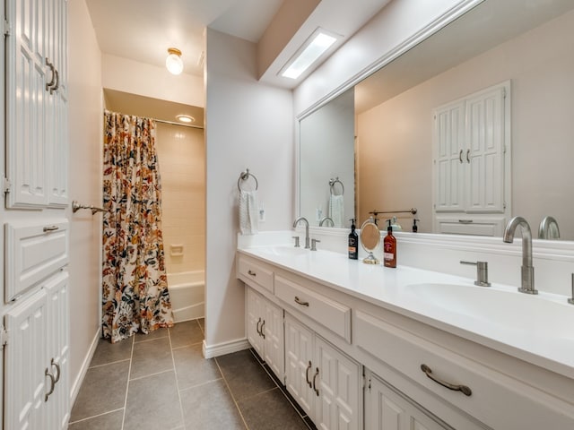 bathroom with vanity, tile patterned floors, and shower / bath combination with curtain