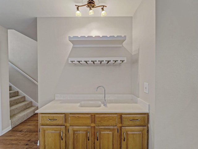 interior space featuring vanity and hardwood / wood-style floors