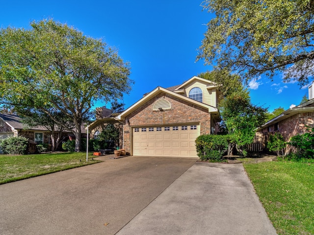 front of property featuring a front yard and a garage