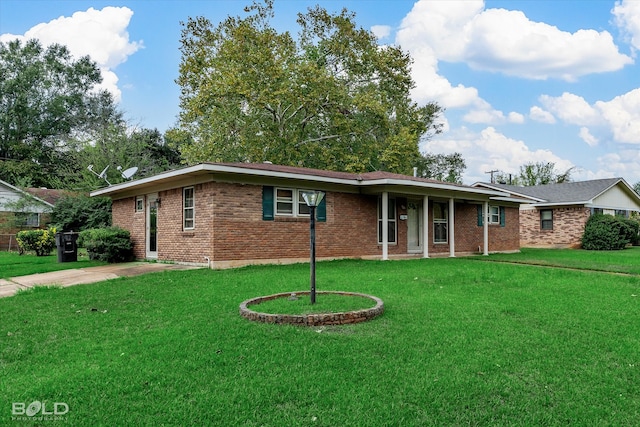 ranch-style house with a porch and a front yard