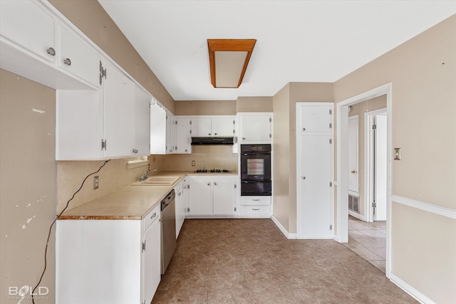 kitchen featuring white cabinetry, gas stovetop, stainless steel dishwasher, and oven