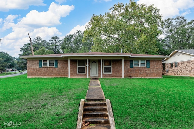 ranch-style house with a front yard