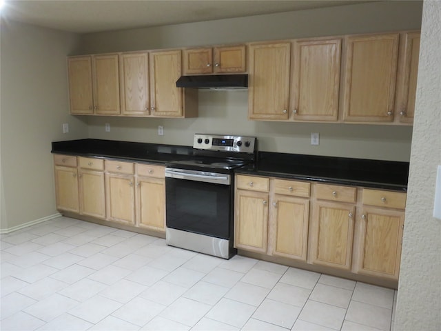 kitchen featuring light brown cabinetry and stainless steel electric range oven