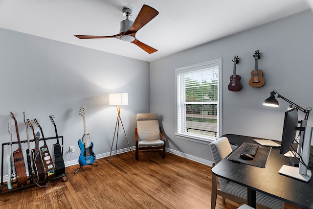 office featuring hardwood / wood-style flooring and ceiling fan