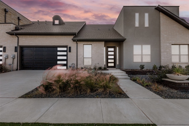 view of front of home featuring a garage