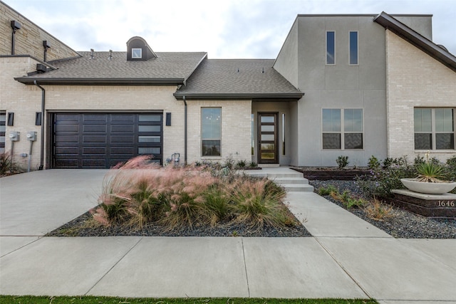 entrance to property featuring a garage