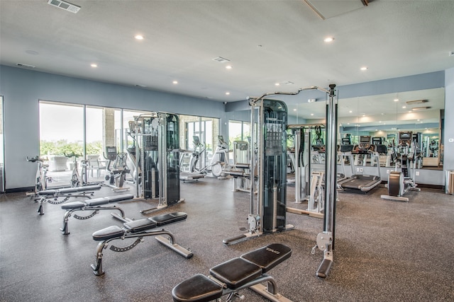 gym with a textured ceiling