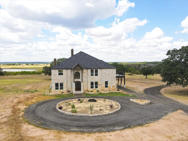 french country inspired facade featuring a rural view