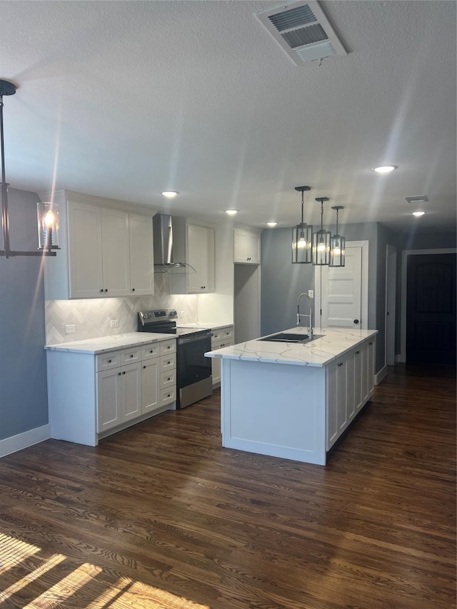 kitchen with wall chimney exhaust hood, stainless steel electric range oven, white cabinets, and hanging light fixtures