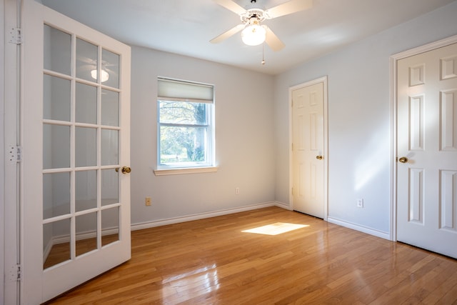 clothes washing area with washer hookup, electric dryer hookup, cabinets, and light tile patterned floors