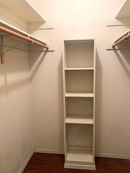 walk in closet featuring dark hardwood / wood-style flooring