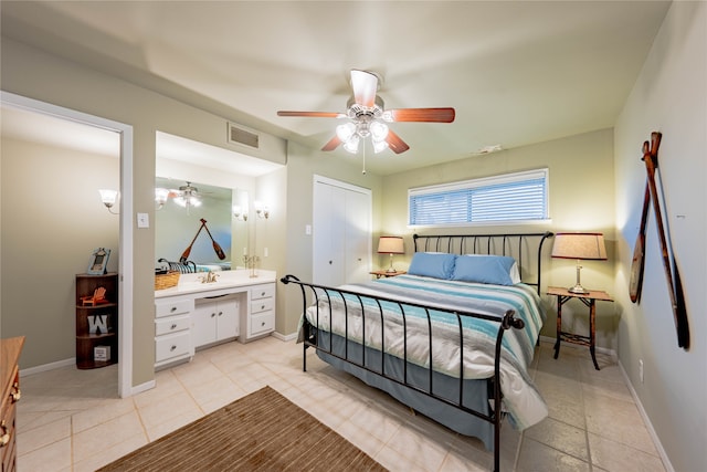 bedroom featuring ceiling fan and a closet