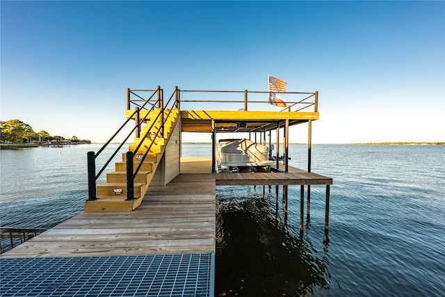 dock area featuring a water view